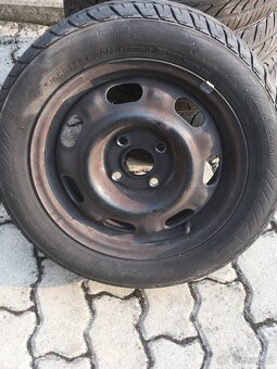 Plechové disky 14”-4x100 s letním pneu-185/55 R14 - 2