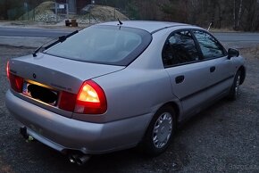 Carisma 1.6 benzín 66kw,rok98 - 2