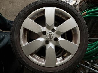 Original alu disky Nissan - 2