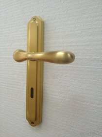 Dveřní klika / kování, zlatá mat, rozteč 72mm /1ks - 2