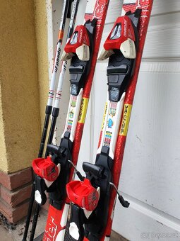 Set dětských carvingových lyží ATOMIC Redster +hole+lyžáky - 2