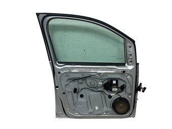 Levé přední dveře stříbrná metalíza LA7W VW Caddy 2k 2008 - 2