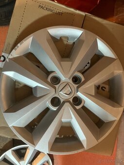 Poklice 15”originál dacia 4x - 2