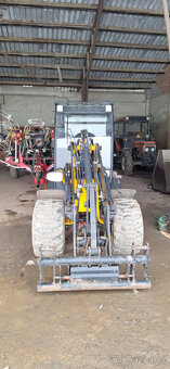 Kloubový nakladač JCB 403 - 2