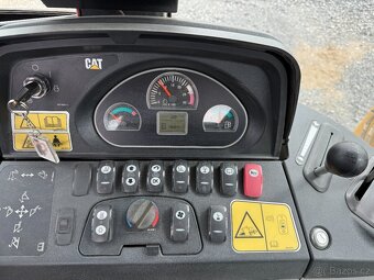 Traktorbagr Cat 428F - 2