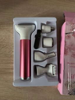 Dámský zastřihávač chloupků - funkční, použitý - 2