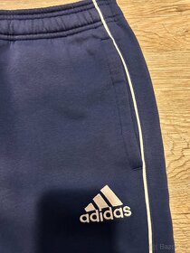 Adidas tepláky nové , vel. L, černé a modré. - 2