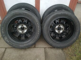 Alu FORD 15- 4x108 obute letni cena je za 4ks celkem - 2