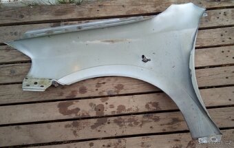 Blatník, dveře Opel Astra G - 2