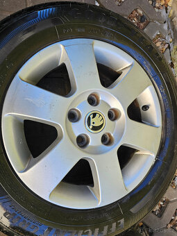 ALU letní kola Orion orig Škoda 5x112 Octavia II R15 - 2