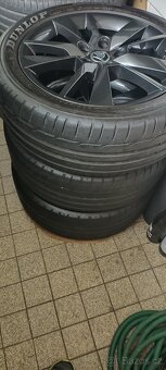 Prodám originál ALU černé TRIUS - 2