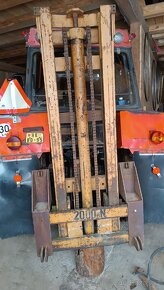 Zvedačka za traktor s vyklápěcí lopatou - 2