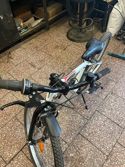 Prodám dětské kolo Rockrider ST100 24”. - 2