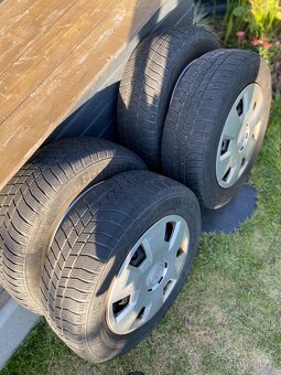 Plechové disky Škoda Octavia 15" + originální poklice - 2