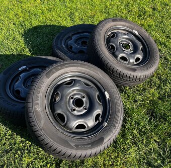 Zimní sada kol 195/60 r14 +poklice honda - 2