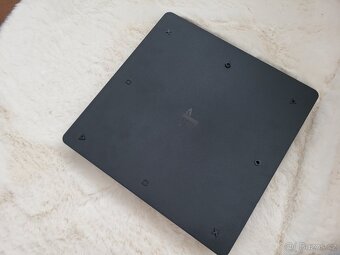 Playstation 4 slim 1tb a 24 her - 2
