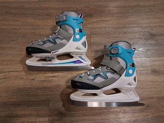 Dívčí lední stavitelné brusle vel. 35-38, jako nové - 2