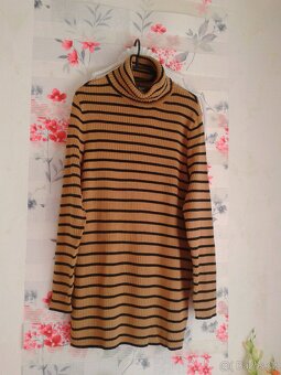 Krásný delší rolákový svetr 46/50 - 2