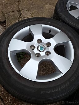 ALU KOLA ŠKODA OCTAVIA II.+LETNÍ PNEU-- 205/60/R15" - 2