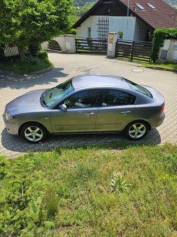 Mazda 3 sedan 1.6 77 kW - 2