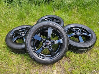 Kompletní letní Alu kola DEZENT - 205/55 R16 - 5x112 - 2