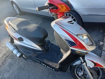 Yuki TXM 125 G - 2