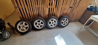 Alu kola Alutec 15" 4x100 7J ET37 střed 64.1 mm - 2