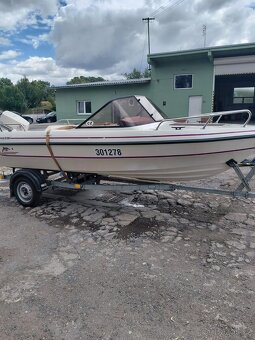 Motorový člun FIBERLINE G 16+  Johnson 70PS + přívěs - 2