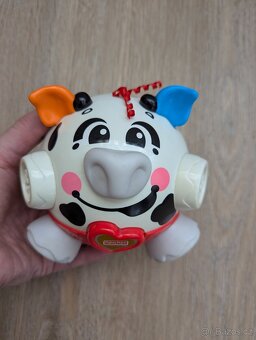 Veselé prasátko značky Fisher Price - 2