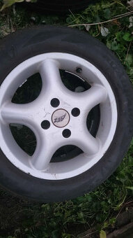 kola R15 4x108 pneu firestone 5 mm - 2