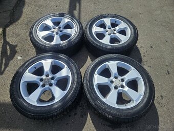 235/55R18 104 H XL včetně disků pro opel antara - 2