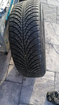 Celoroční pneu s disky 5x112 .215/65 r16 - 2