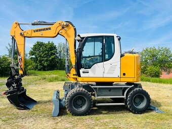 Kolové rypadlo Liebherr A910 Compact - 2