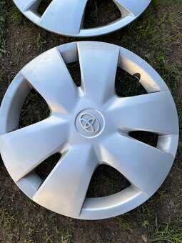 Poklice na plechové disky r14 Toyota - 2