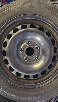 Sada 5x112 215/60R16 99V - 2