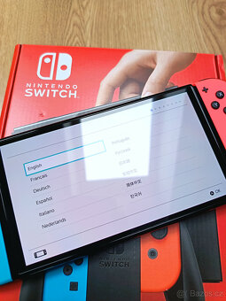 Prodám nové Nintendo Switch OLED (Neon Blue / Red) v záruce - 2