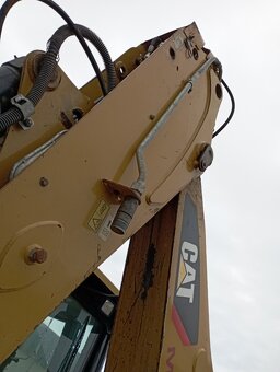 Prodám Caterpillar 428F, rok 2015 - 2