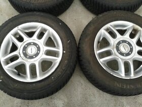 Mazda originál alu 4x100 185/65/14 zimní - 2