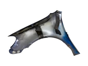 Pravý blatník tmavě modrá metalíza VW Golf 6 kombi 2011 - 2