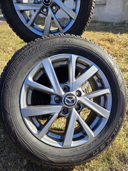 Zánovní orig.zimní sada Mazda 3 16" 5x114,3 pneu 205/60/16 - 2