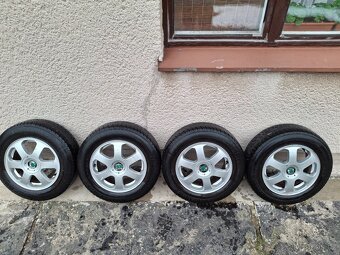 ALU ORIG. ŠKODA 15" 5x100 57,1 Střed - 2