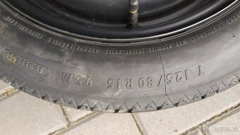 Dojezdová rezerva Ford - 2