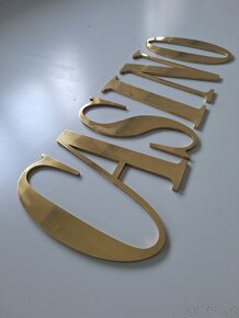 Nápis CASINO z mosazi - 2