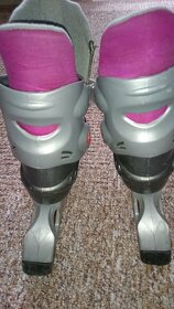 Prodám dívčí kolečkové brusle vel. 30-33 - 2