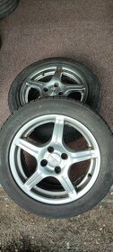 Anzio alu disky 4x108, 6,5J x 16H2, letní pneu 205/55/r16 - 2