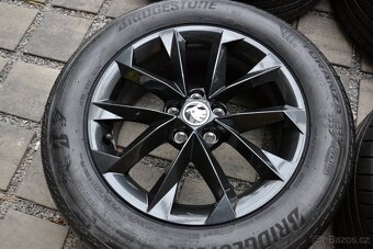 Š.Kamiq,Scala, VW Taigo – NOVÉ Alu + letní 205/60R16 Bridges - 2