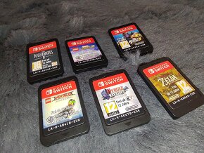 Nintendo Swich + 6 her + černý obal - 2
