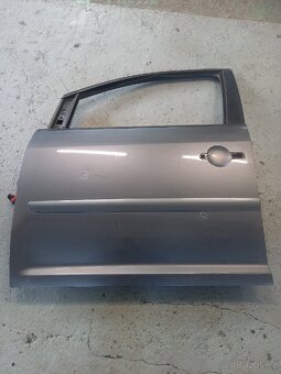 Vw touran,caddy dvere leve predni. - 2