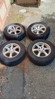 Sada zimních alu kol 215/70 R16 - 2