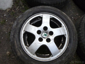 4x alu disky škoda (5x100) letní pneu 185/60 r14 - 2